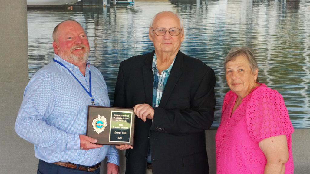 2026 Friend of Extension Award recipient with plaque